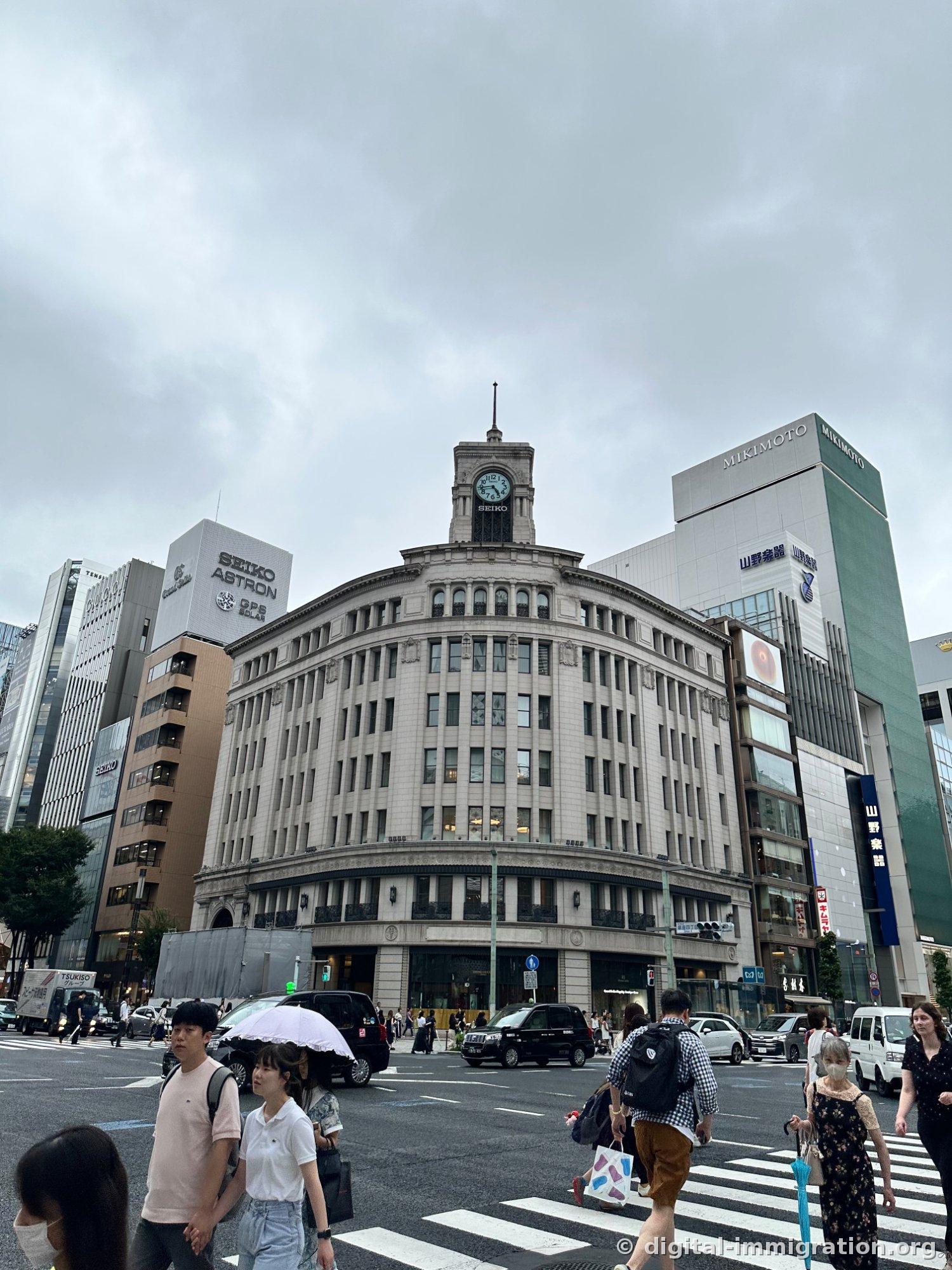 Wako building and Ginza crosswalk with people on overcast day, Mikimoto and Yamano musical instruments building visible to right