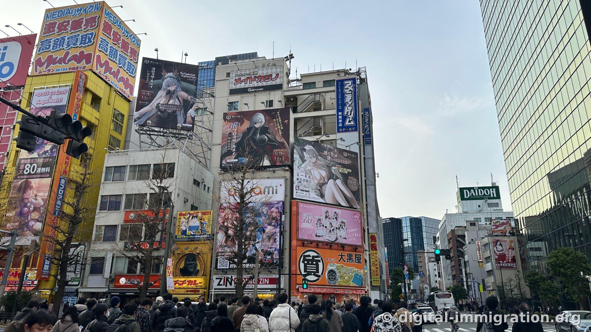 Winter afternoon Akihabara crosswalk crowded with people, bare trees, Maid Casino and Daikokuya signs