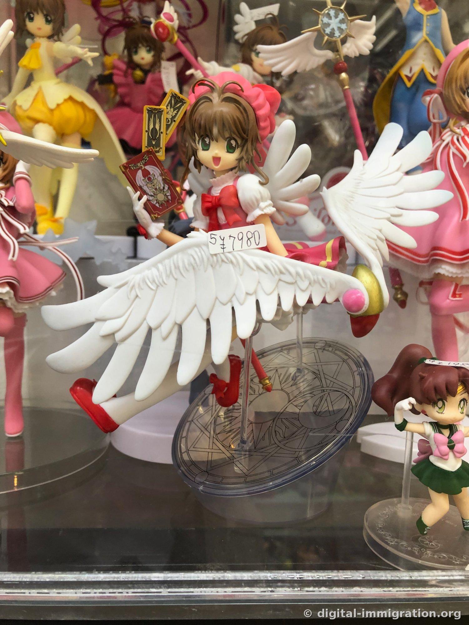 Card Captor Sakura figure in glass case with handwritten ¥7,980 price tag