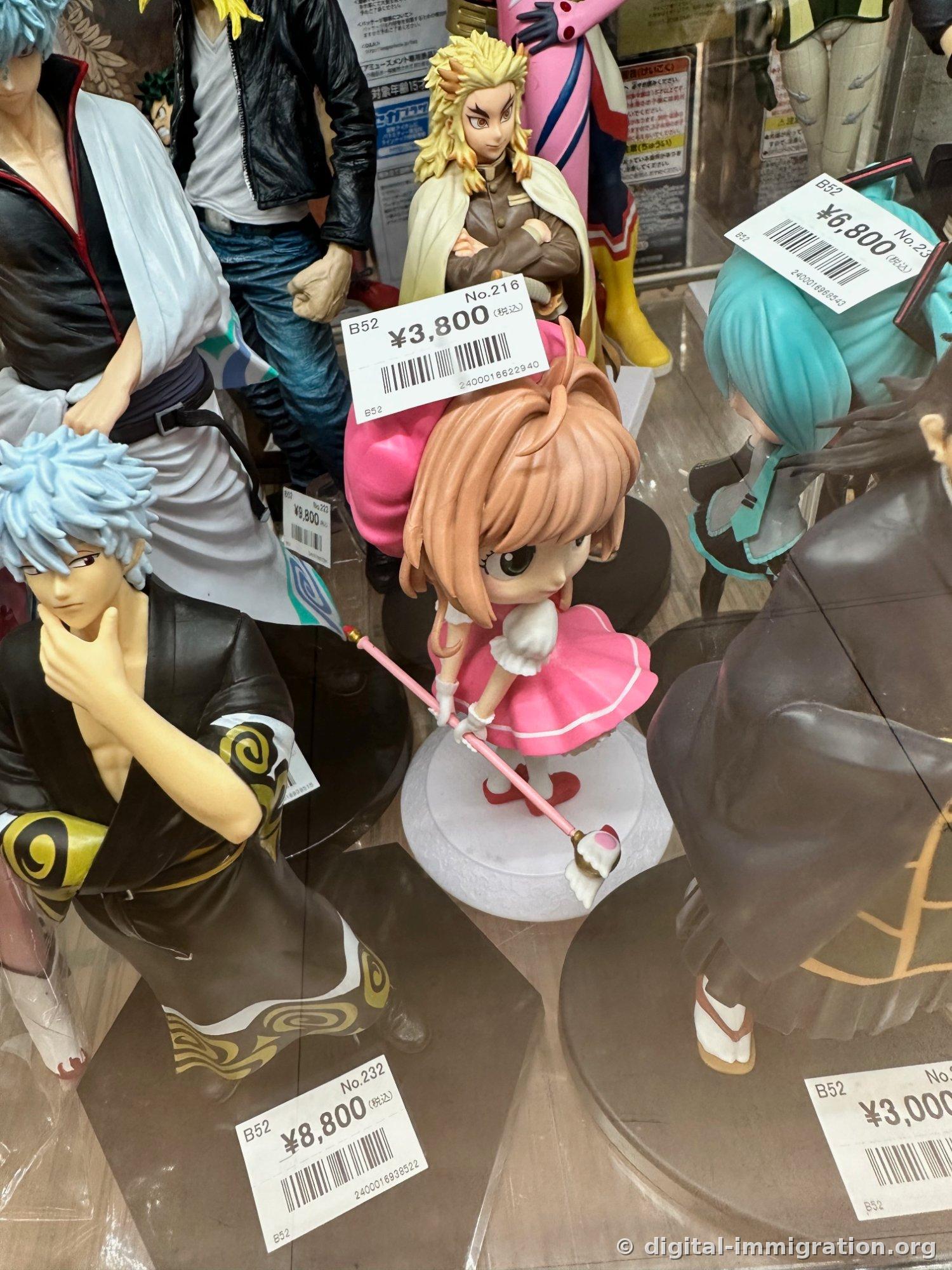 Used figures with barcode price tags, ¥3,800 Sakura and ¥8,800 Gintoki figure